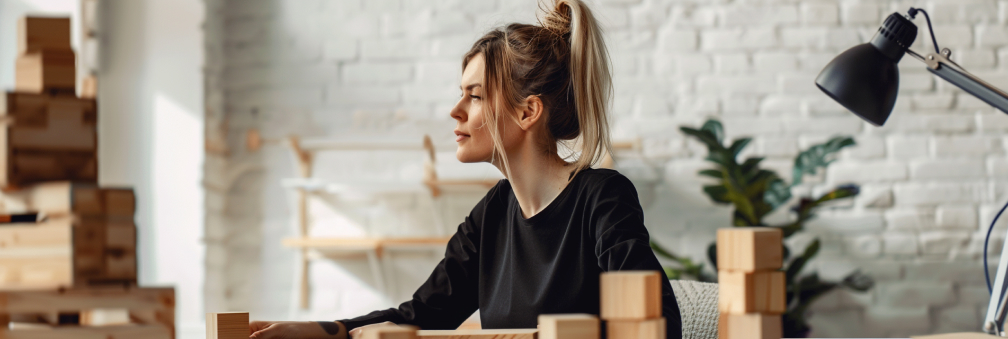 girl programmer with a wooden tech stack